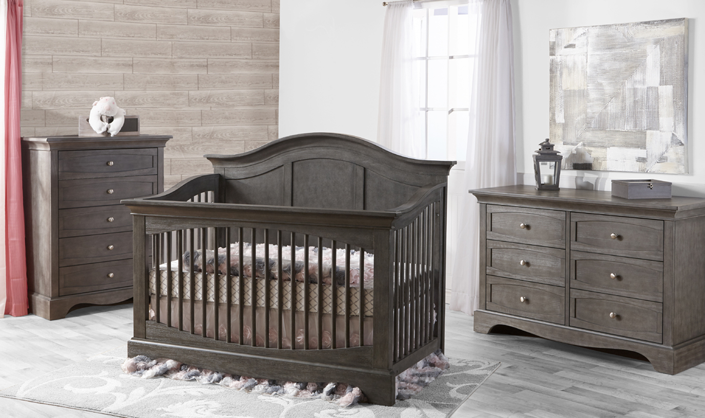 The <b>Enna Forever Crib</b> is a sweet and stylish piece that coordinates nicely with both the Ragusa, Marina and Torino Collections.  Shown here in its new finish: <b>Distressed Granite</b>.