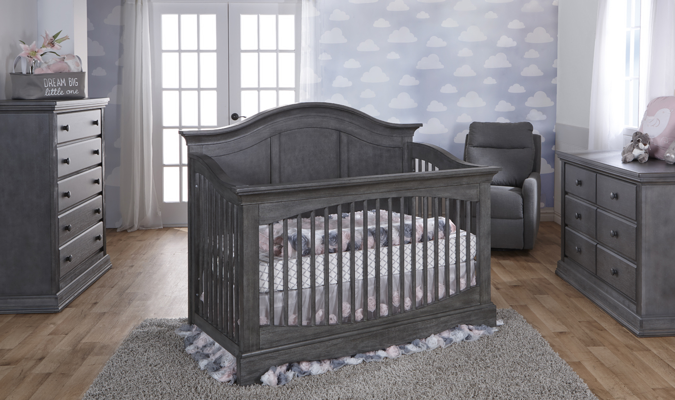 The <b>Enna Forever Crib</b> is a sweet and stylish piece that coordinates nicely with the Ragusa, Marina, Modena and Torino Collections.<br>  Here shown with Modena case goods, in Distressed Granite. 